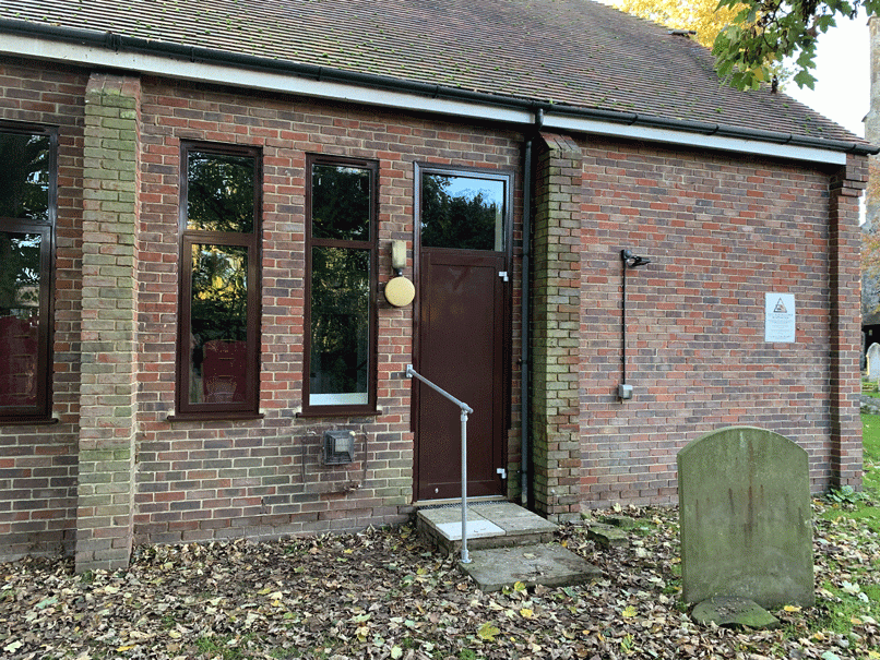 Aspect of the hall showing new fire door and windows