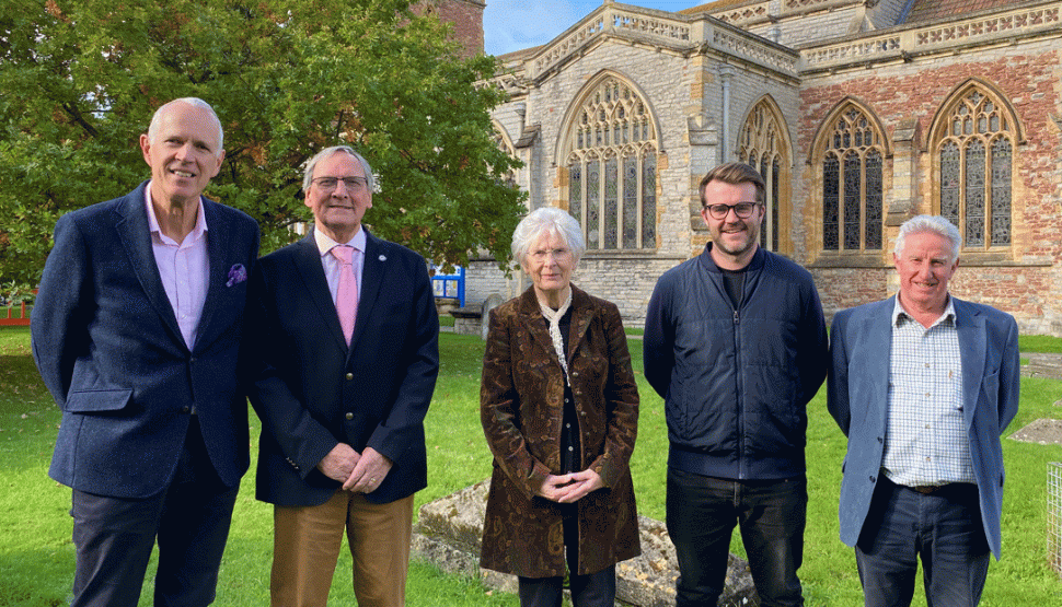 The five directors of Valencia Communities Fund in front of St Mary's Church, Bridgwater