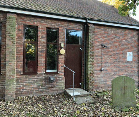 Aspect of the hall showing new fire door and windows