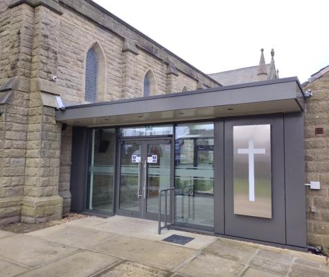 External view of the new glass link between the church and the hall