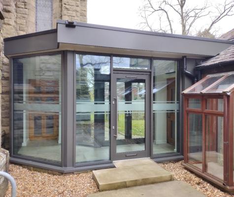 External view of the new glass link between the church and the hall