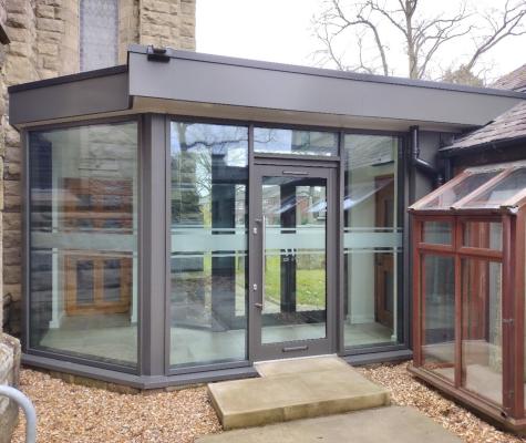 External view of the new glass link between the church and the hall